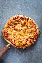 unsplash_pvpugAWd6_g_peri peri paneer pizza .webp