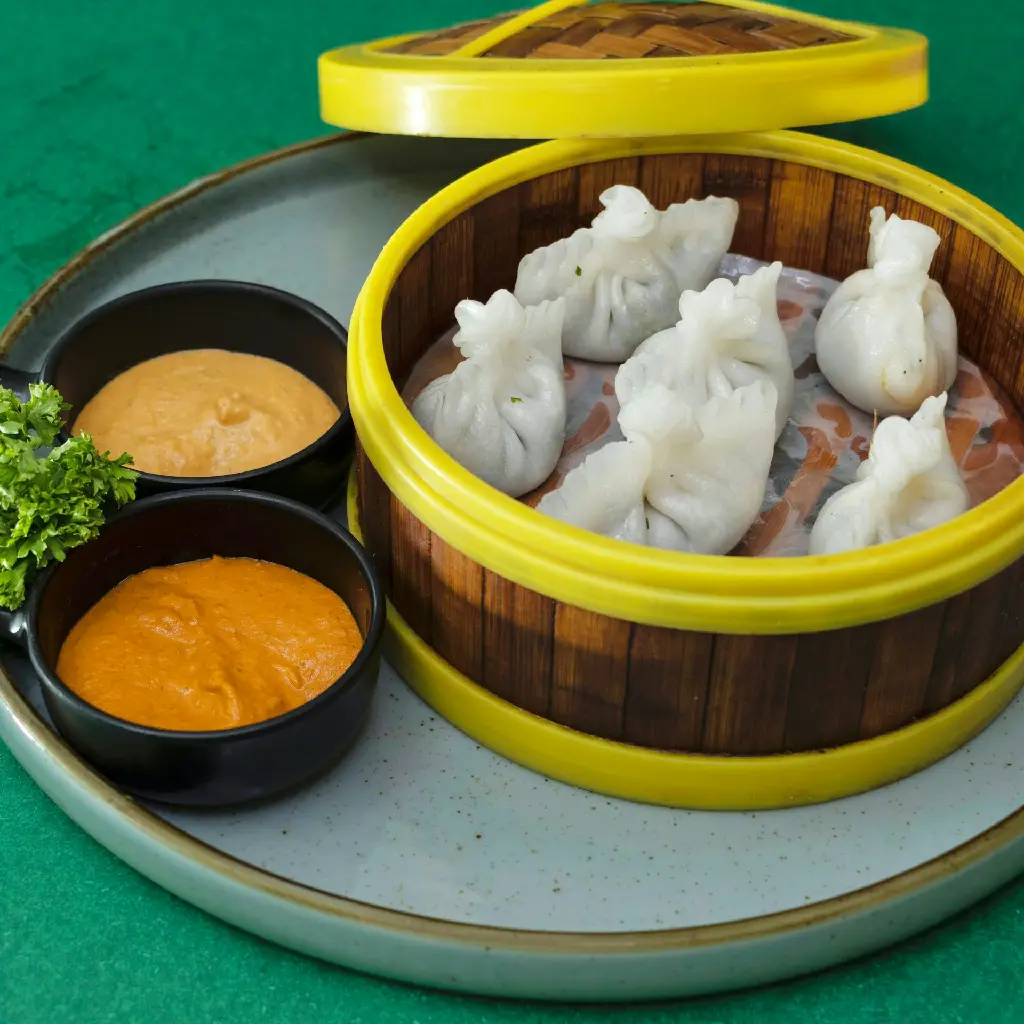 unsplash_xuFAsfnsnM0_steamed veg momos.jpg.webp